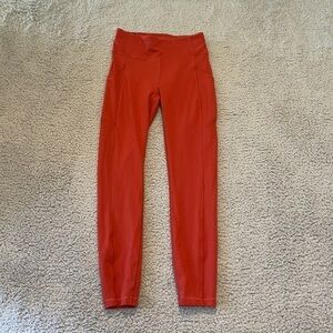 Lululemon Wunder Train High-Rise Tight with Pockets 24" color orange size 4